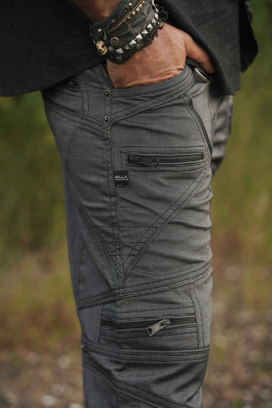 Detailed stitchwork and pocket design on glitch-print cargo pants