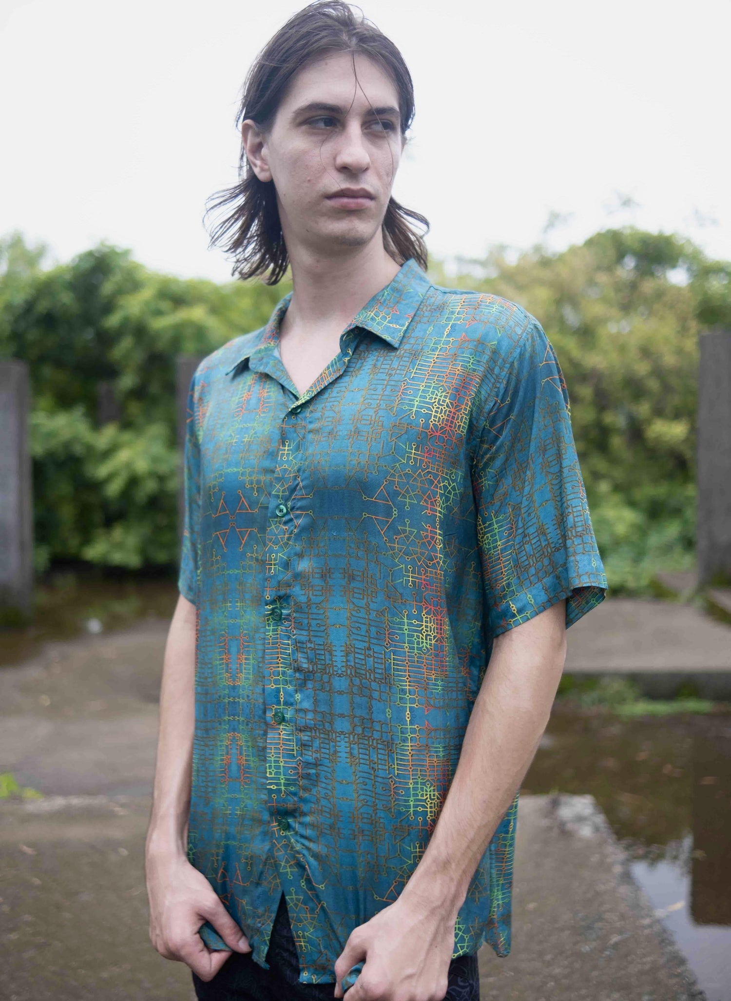 Men wearing bamboo lightweight summer shirt with blue geometric pattern