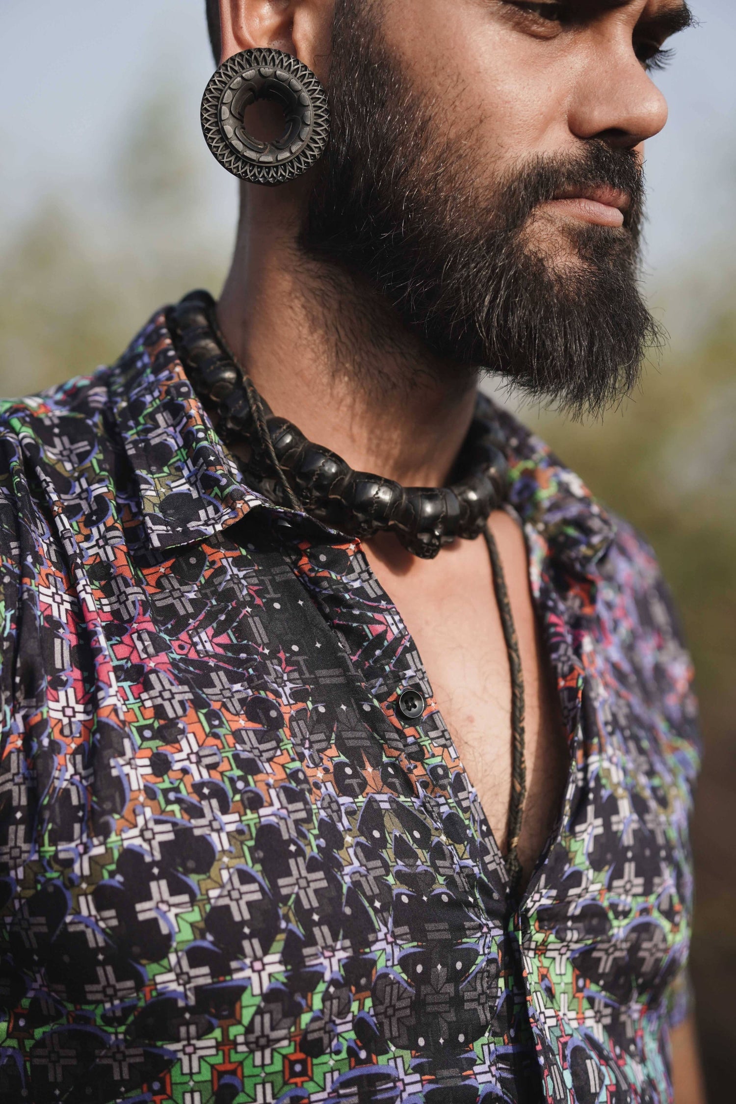 Close-up of EQUILIBRIUM v2 bamboo modal shirt showing psychedelic fractal pattern