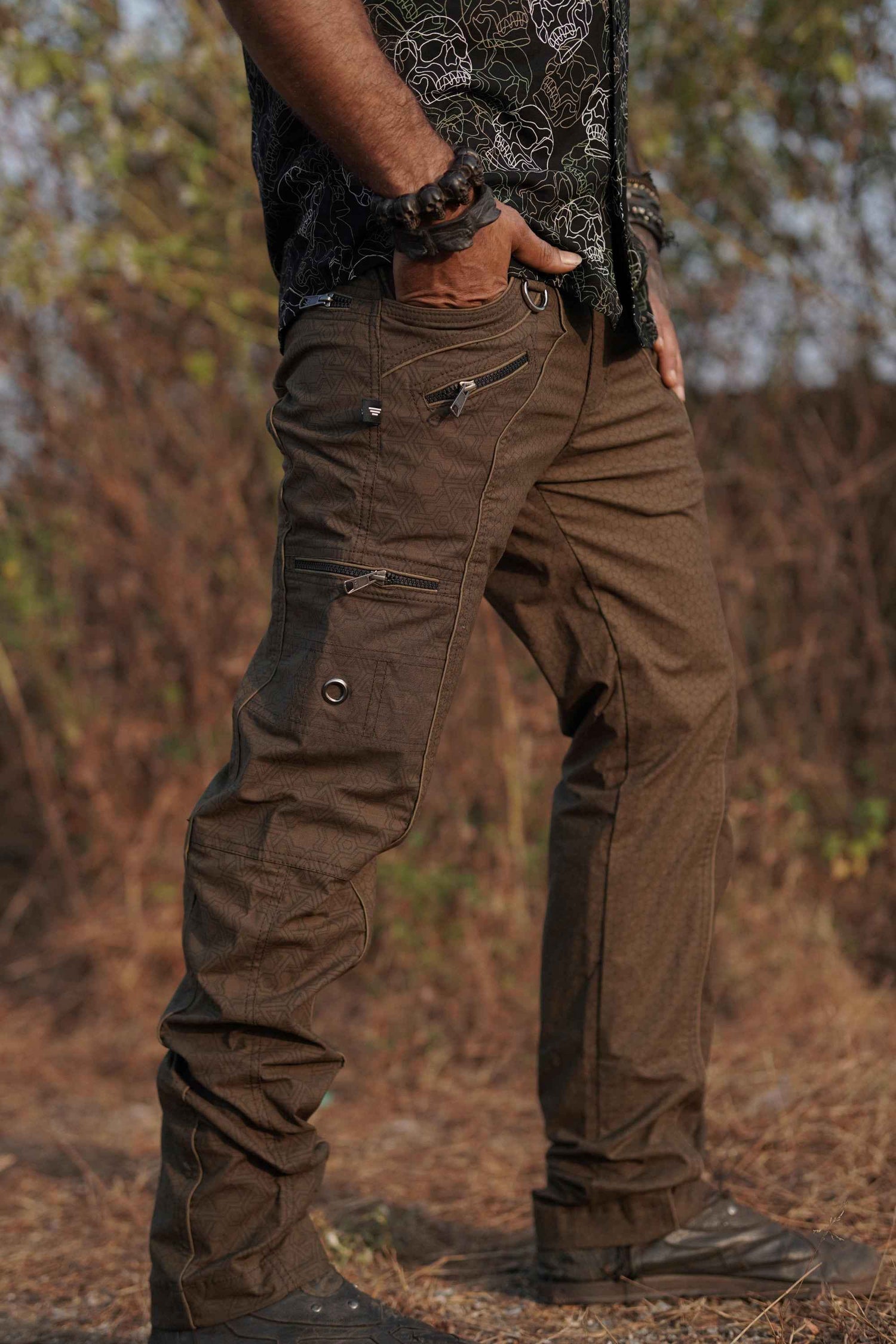 Side view of khaki NY street wear cargo pants with zipper pockets