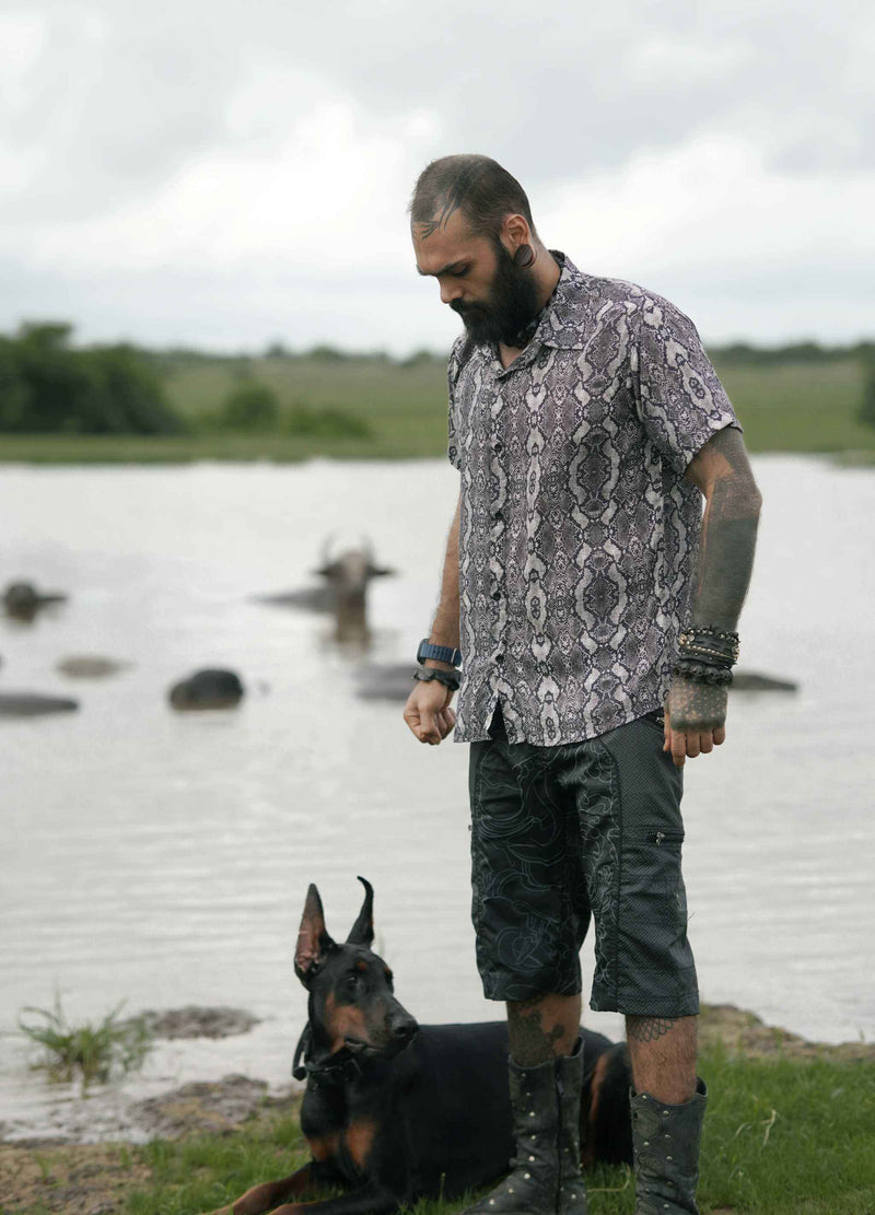Man wearing eco-friendly bamboo shirt for men with psychedelic python abstract print