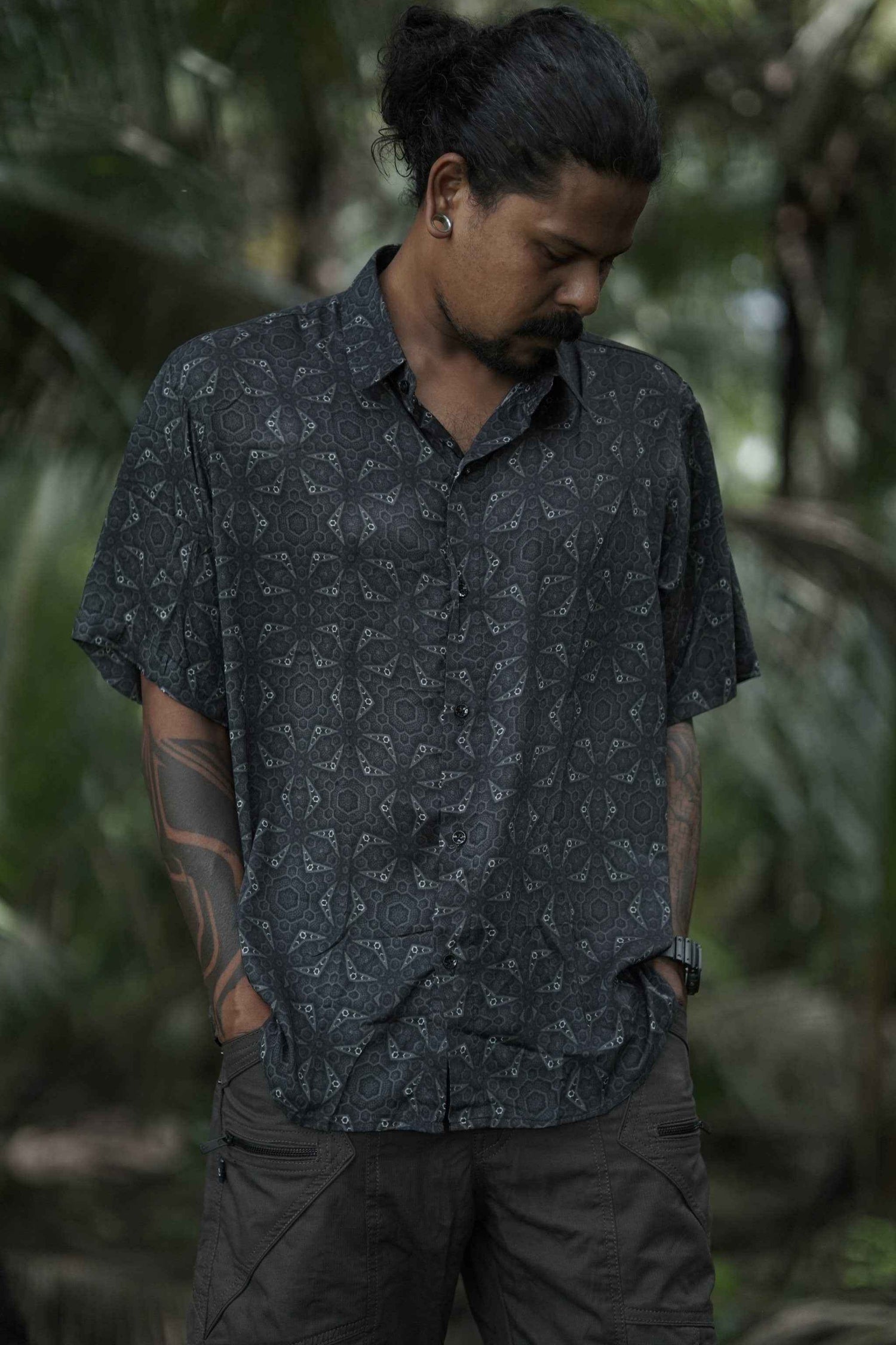 Men wearing bamboo short sleeve psytrance shirt with geometric psychedelic design