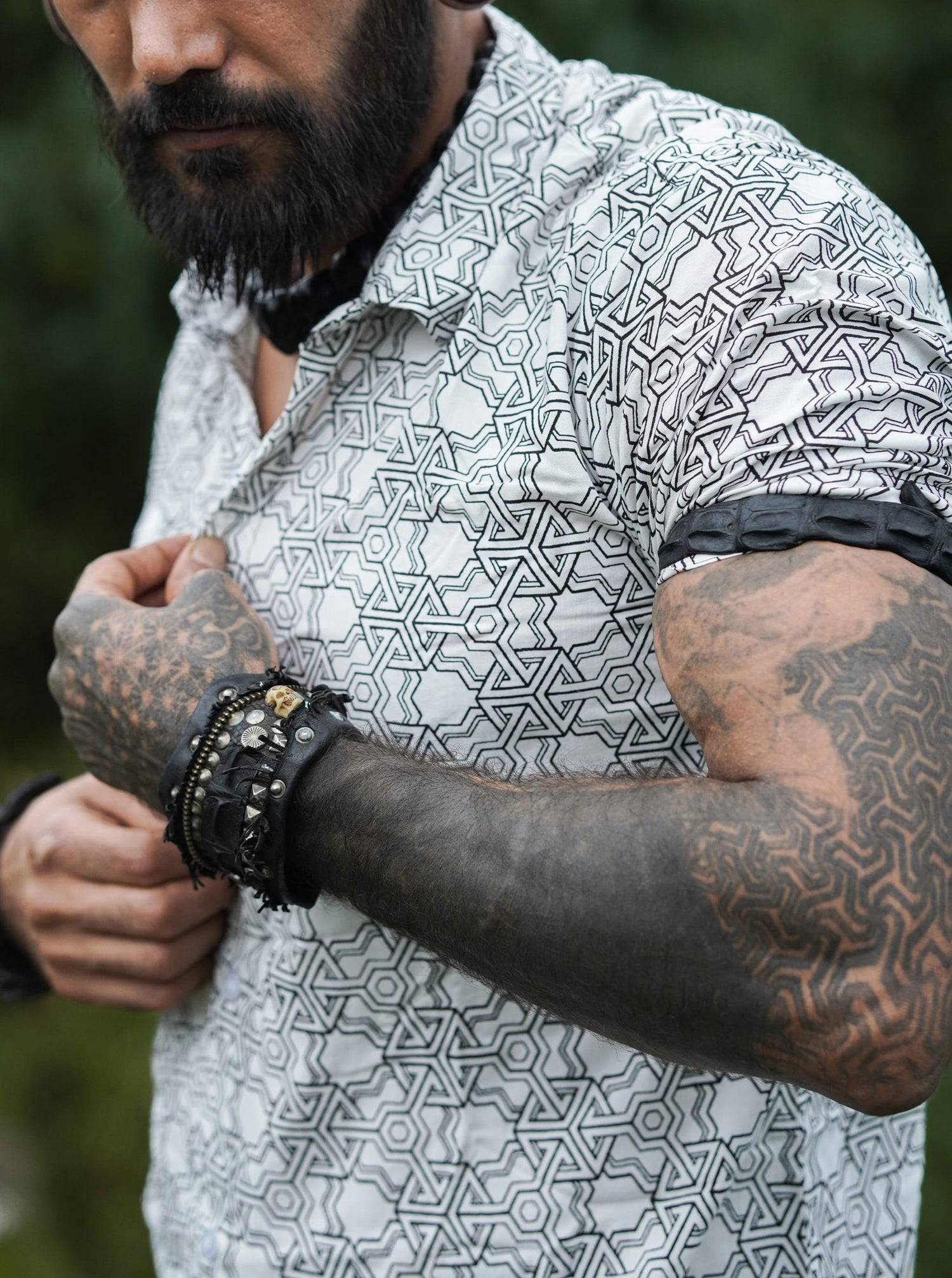 Close-up of Pythagoras white men's viscose shirt featuring sacred geometry print and short sleeves