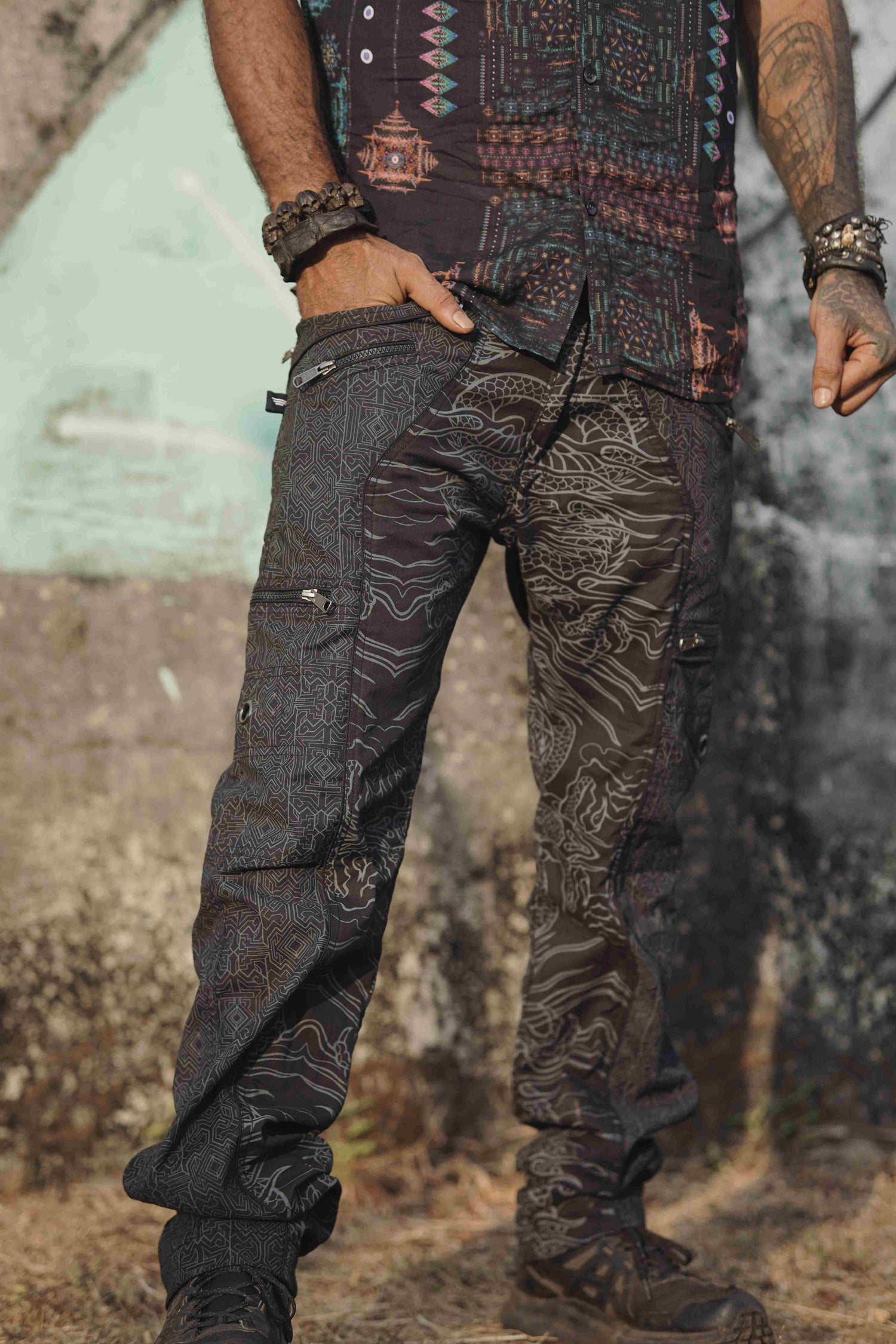 Front view of Dragon Codex adjustable cargo trousers in black cotton