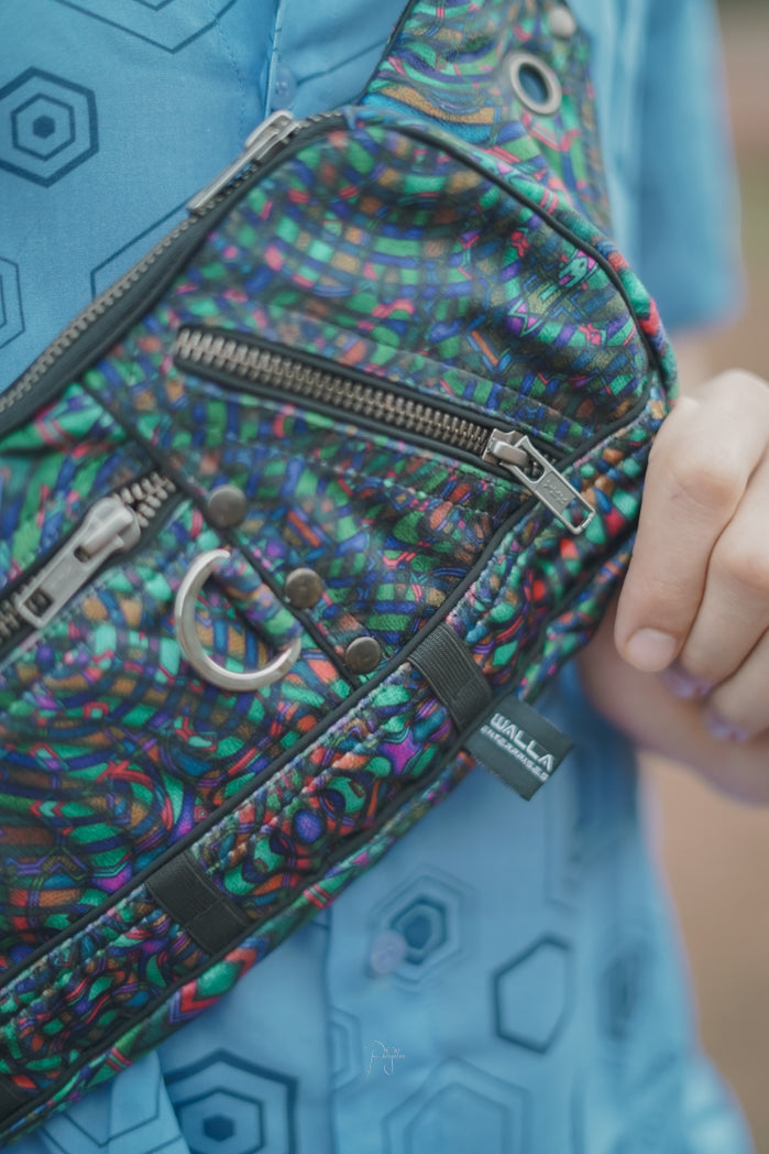 Unisex psychedelic crossbody bag with sacred geometry print and secret pockets – perfect for festivals