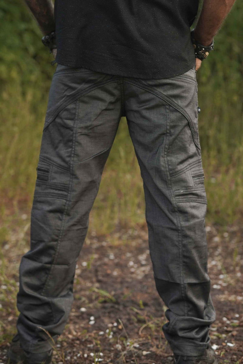 Back-vews of grey glitch pattern on men's festival cargo pants