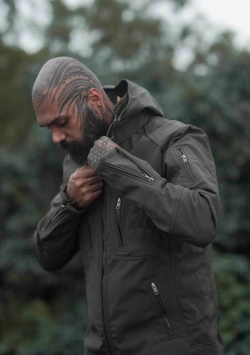 olive green festival windbreaker jacket for men with multiple zipper pockets front view