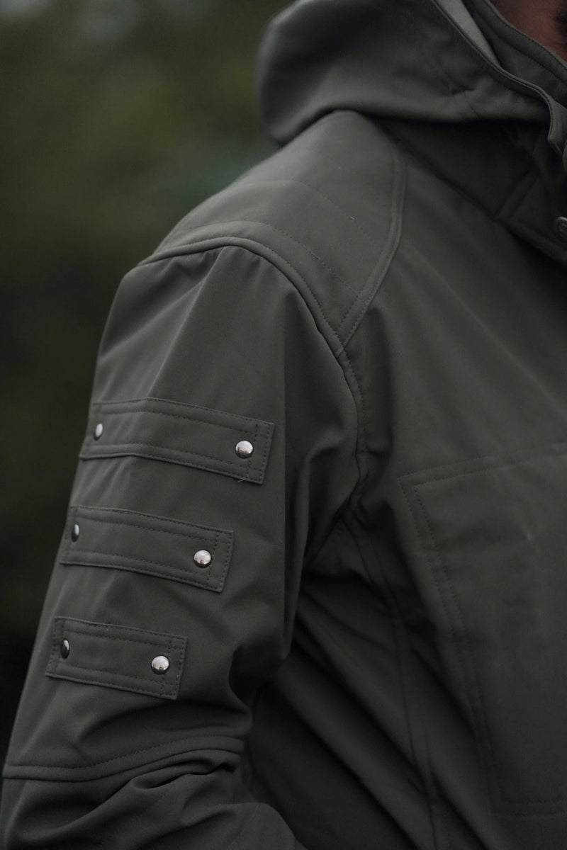 sleeve detail olive green festival windbreaker jacket with metal hardware and straps