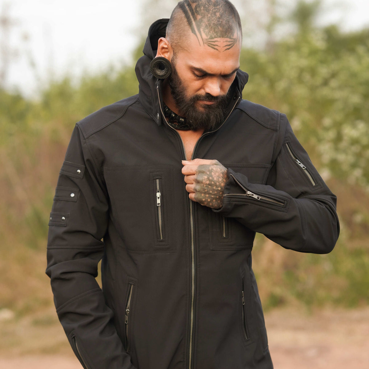 black tactical waterproof jacket men full body outdoor view