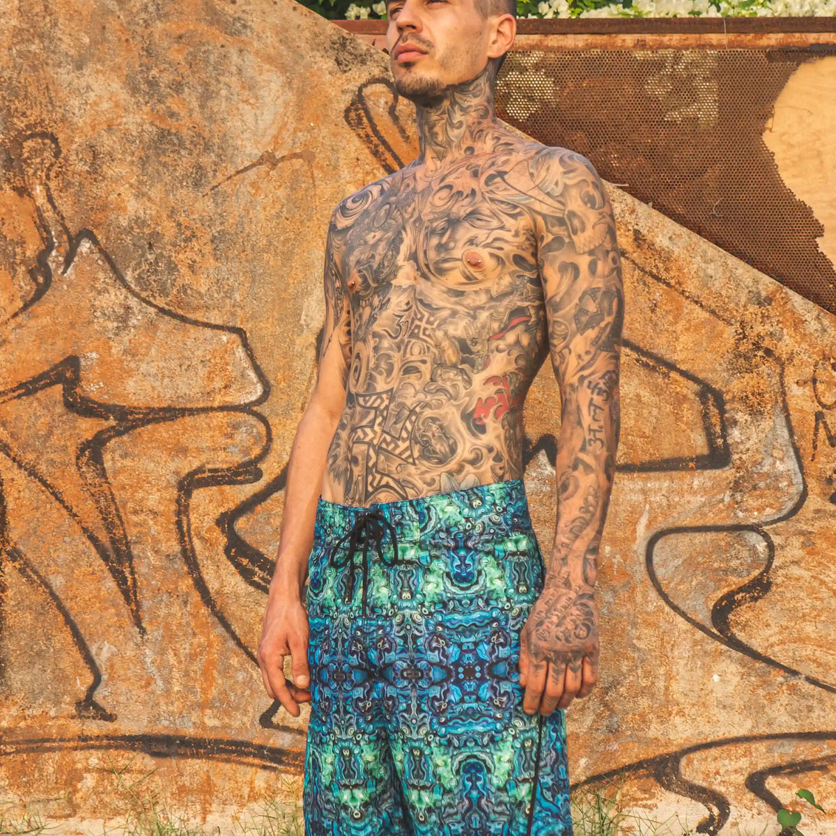 blue illusion swim shorts side angle psychedelic pattern