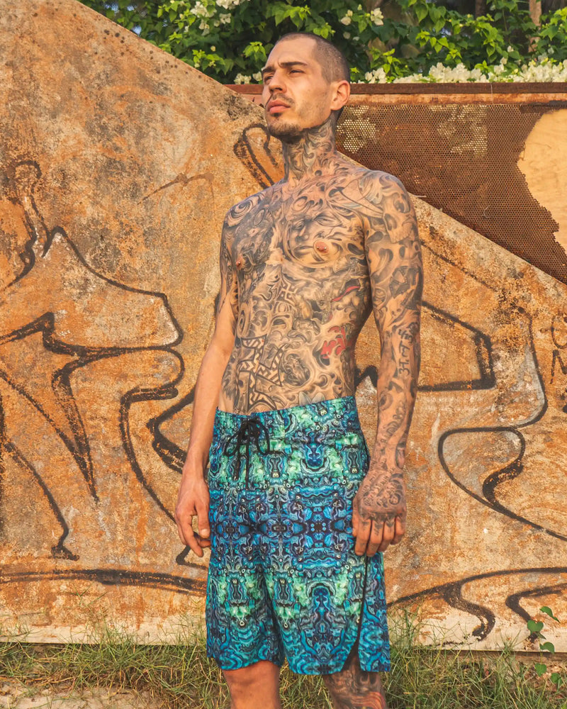 blue illusion swim shorts side angle psychedelic pattern
