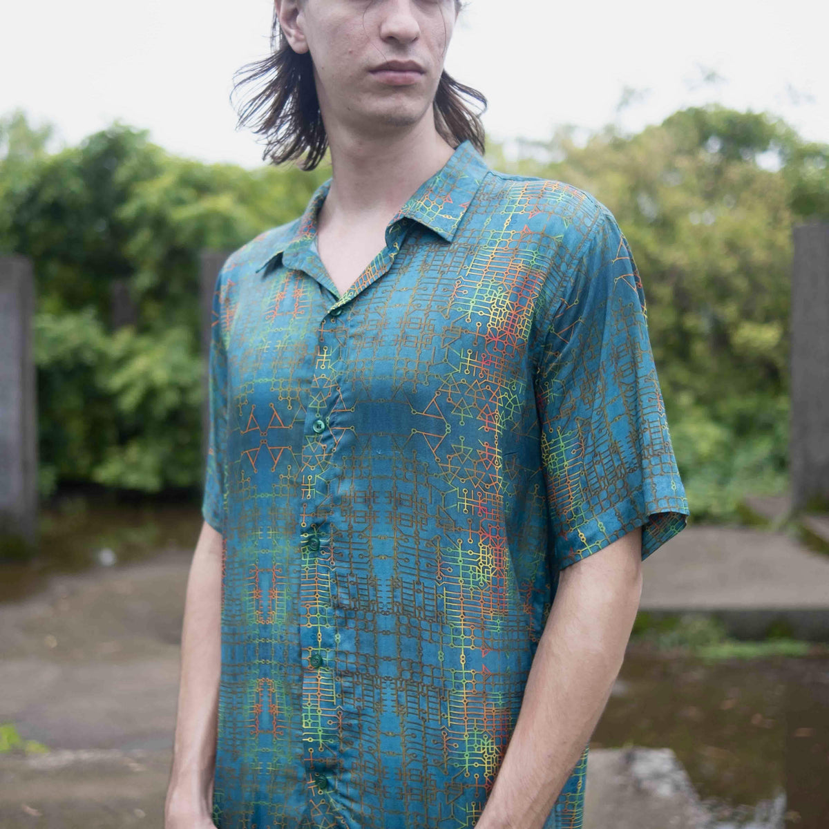 Men wearing bamboo lightweight summer shirt with blue geometric pattern
