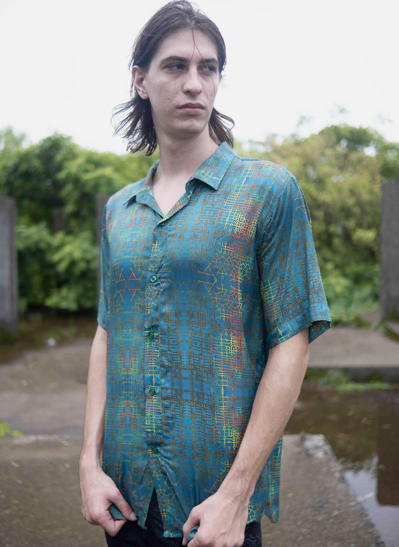 Men wearing bamboo lightweight summer shirt with blue geometric pattern