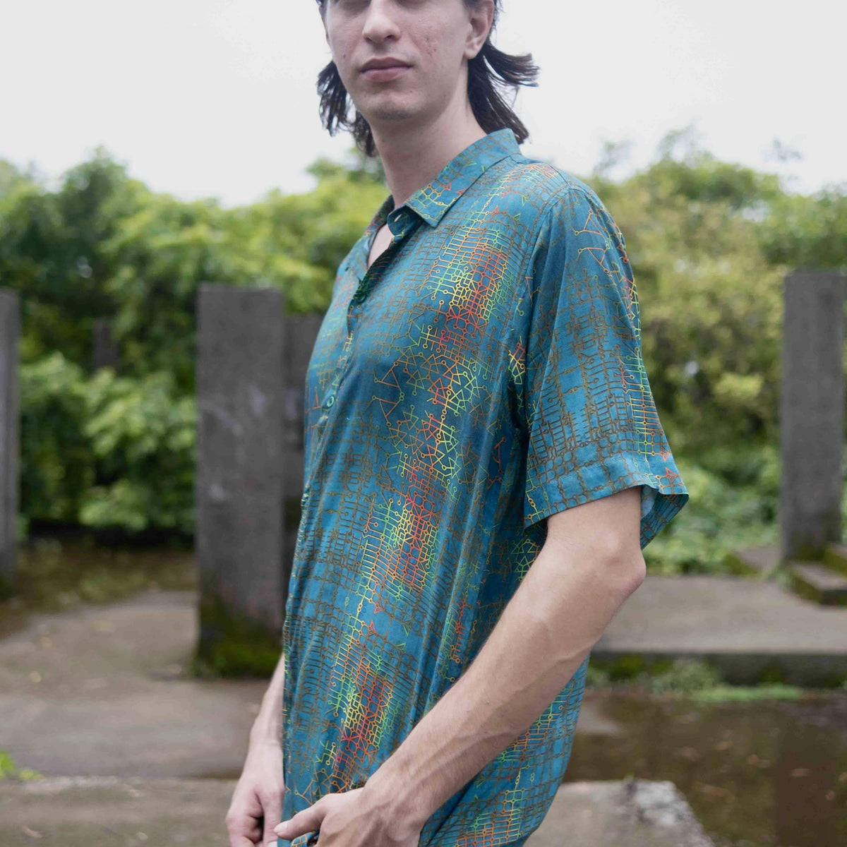 Men’s bamboo lightweight button up shirt worn outdoors in summer