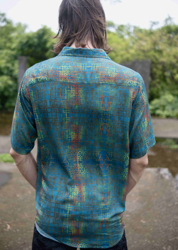 Back view of men’s bamboo lightweight summer shirt with geometric design