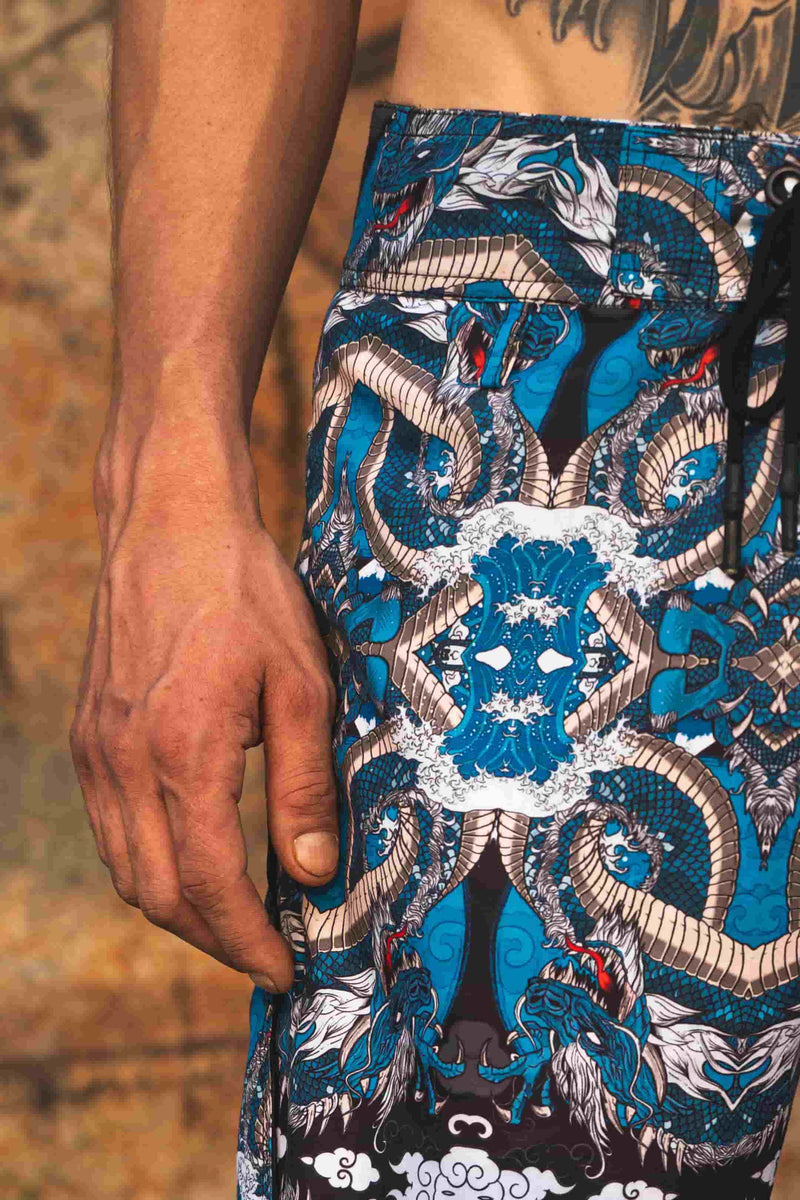 detail of blue japanese dragon printed swim shorts pattern
