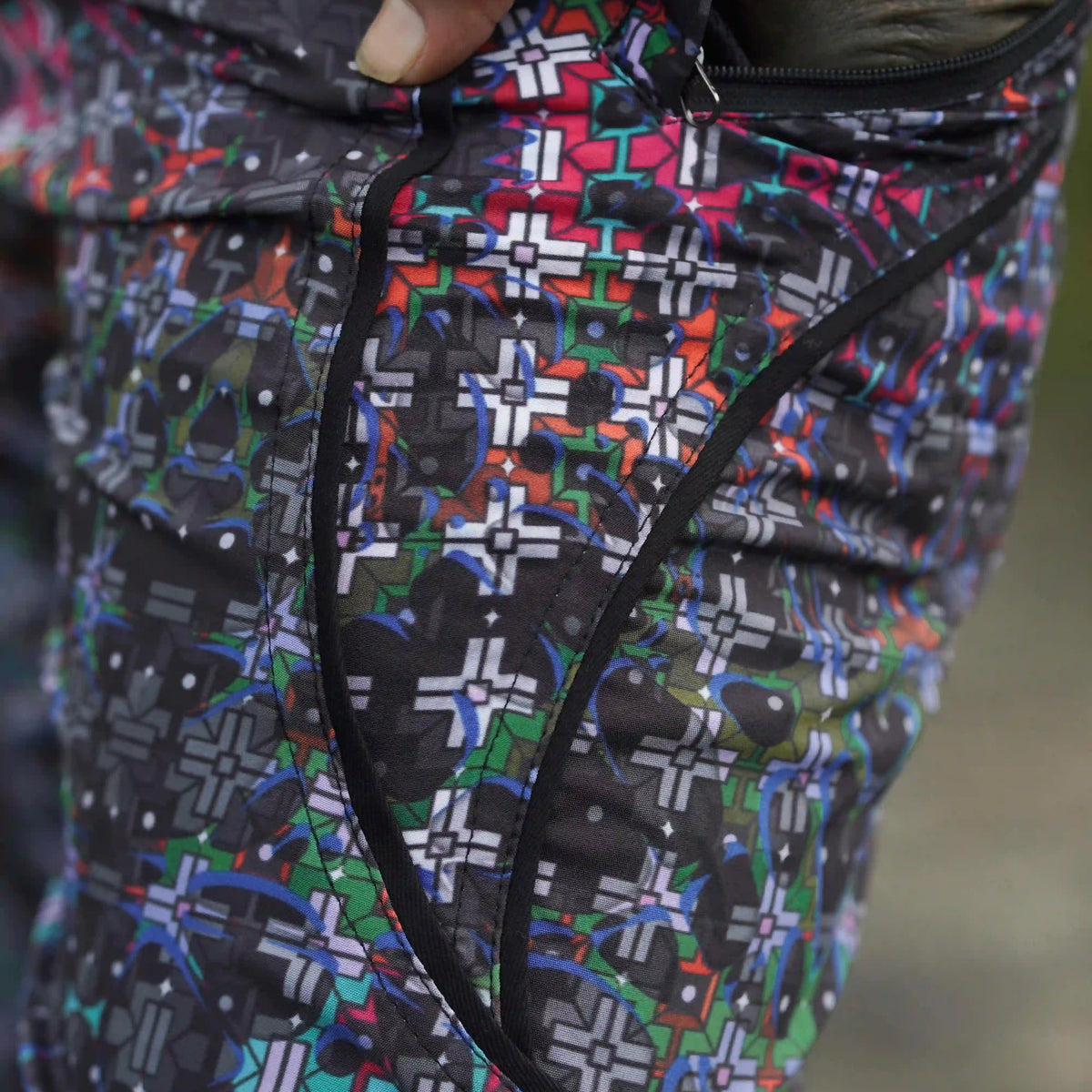 psychedelic geometric swim shorts close-up pattern