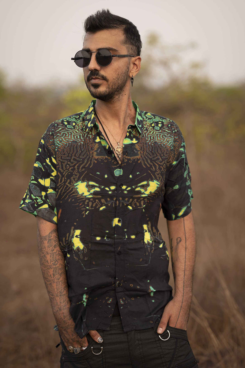 Men wearing bamboo psychedelic shirt with green and black abstract pattern