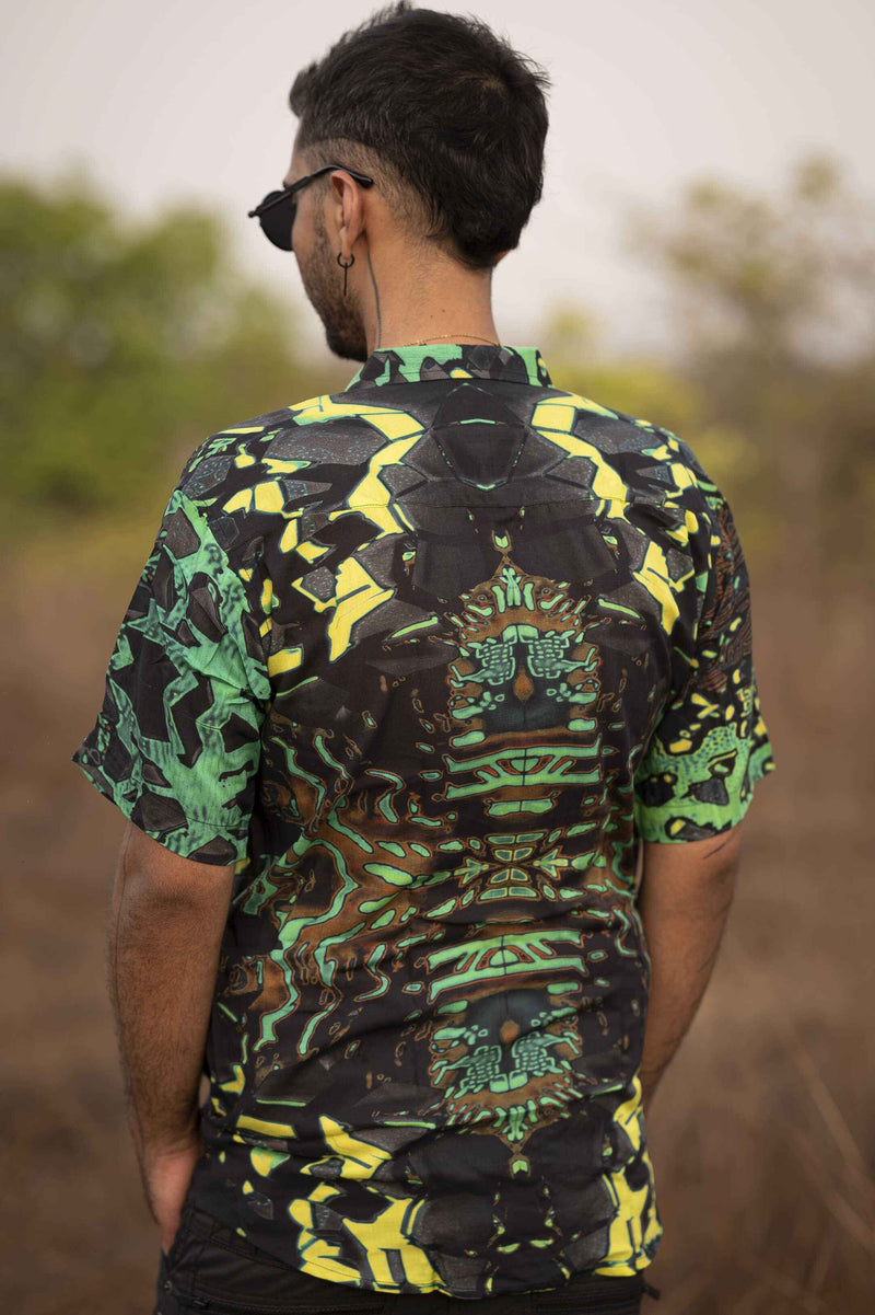 Close-up of green bamboo psychedelic shirt showing detailed geometric design