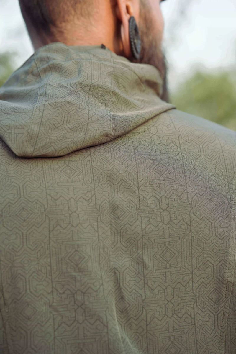 Back view of khaki hooded festival windbreaker jacket with subtle geometric pattern detail