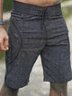 black cyberpunk board shorts for men front view
