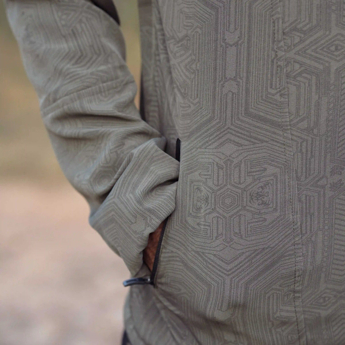 Khaki festival windbreaker jacket side pocket detail with zipper closure