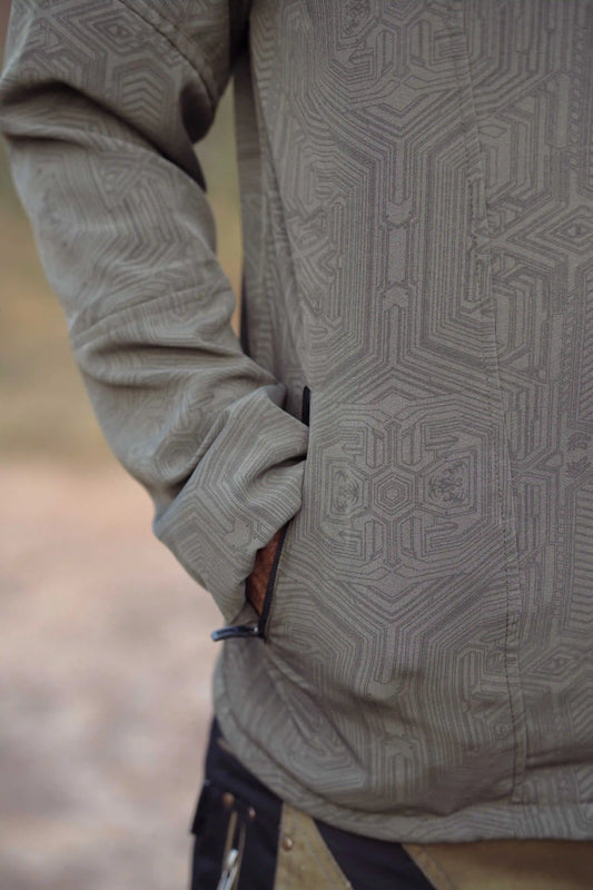 Khaki festival windbreaker jacket side pocket detail with zipper closure