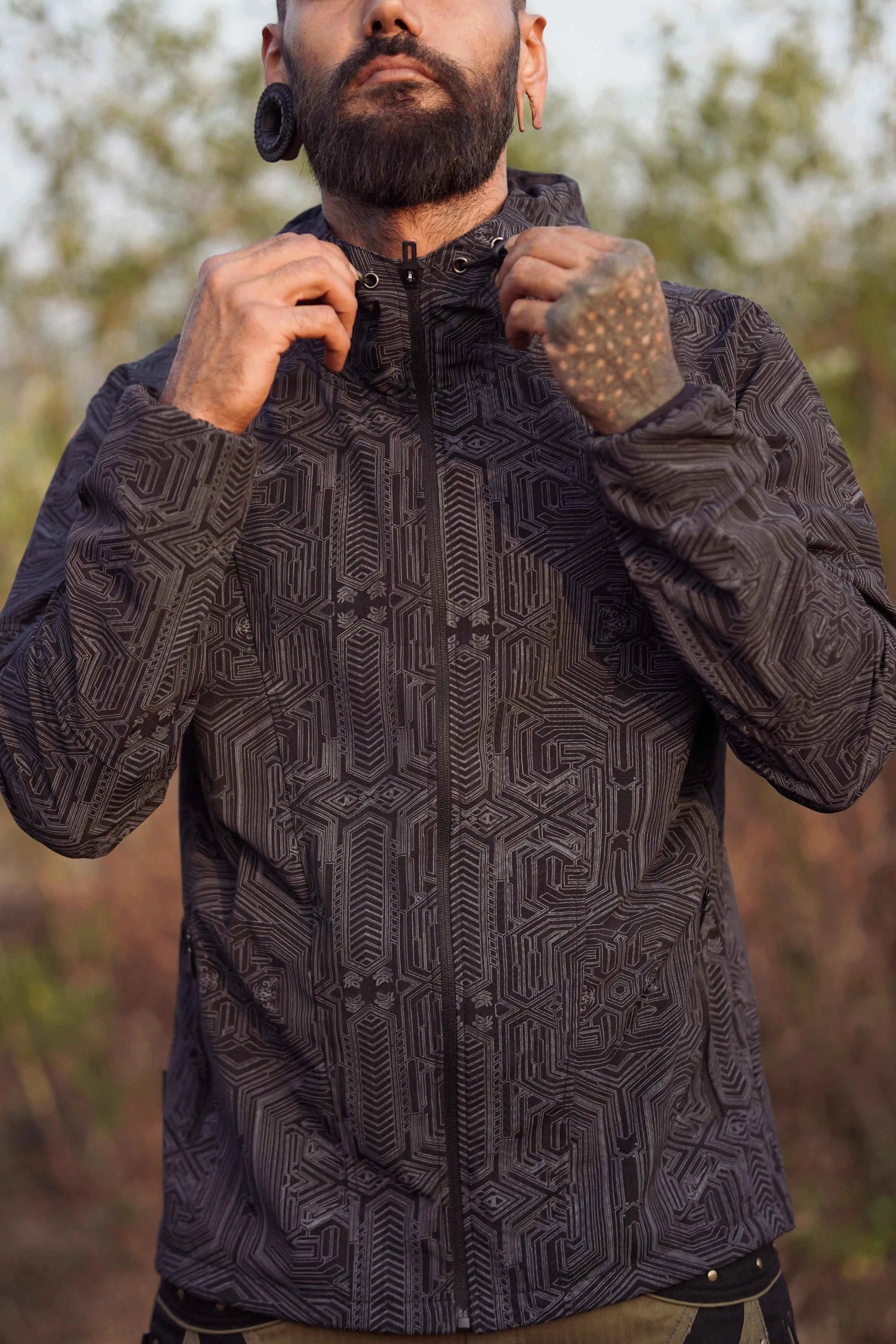 Black psychedelic windbreaker jacket with Metanoia geometric print front view