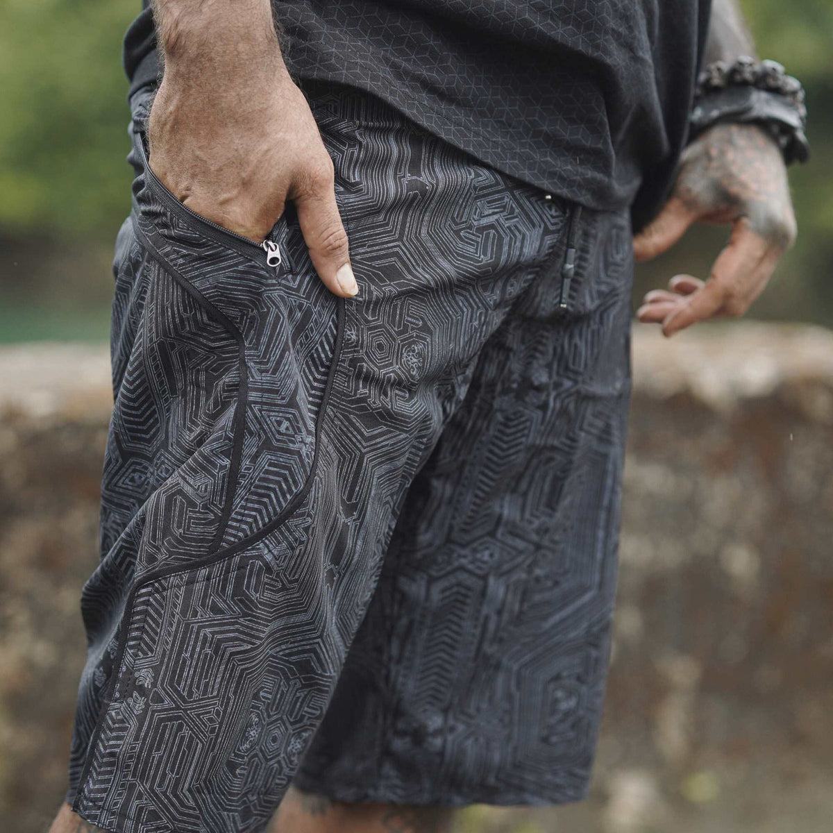 cyberpunk swim shorts for men black geometric design with zipper pocket side view
