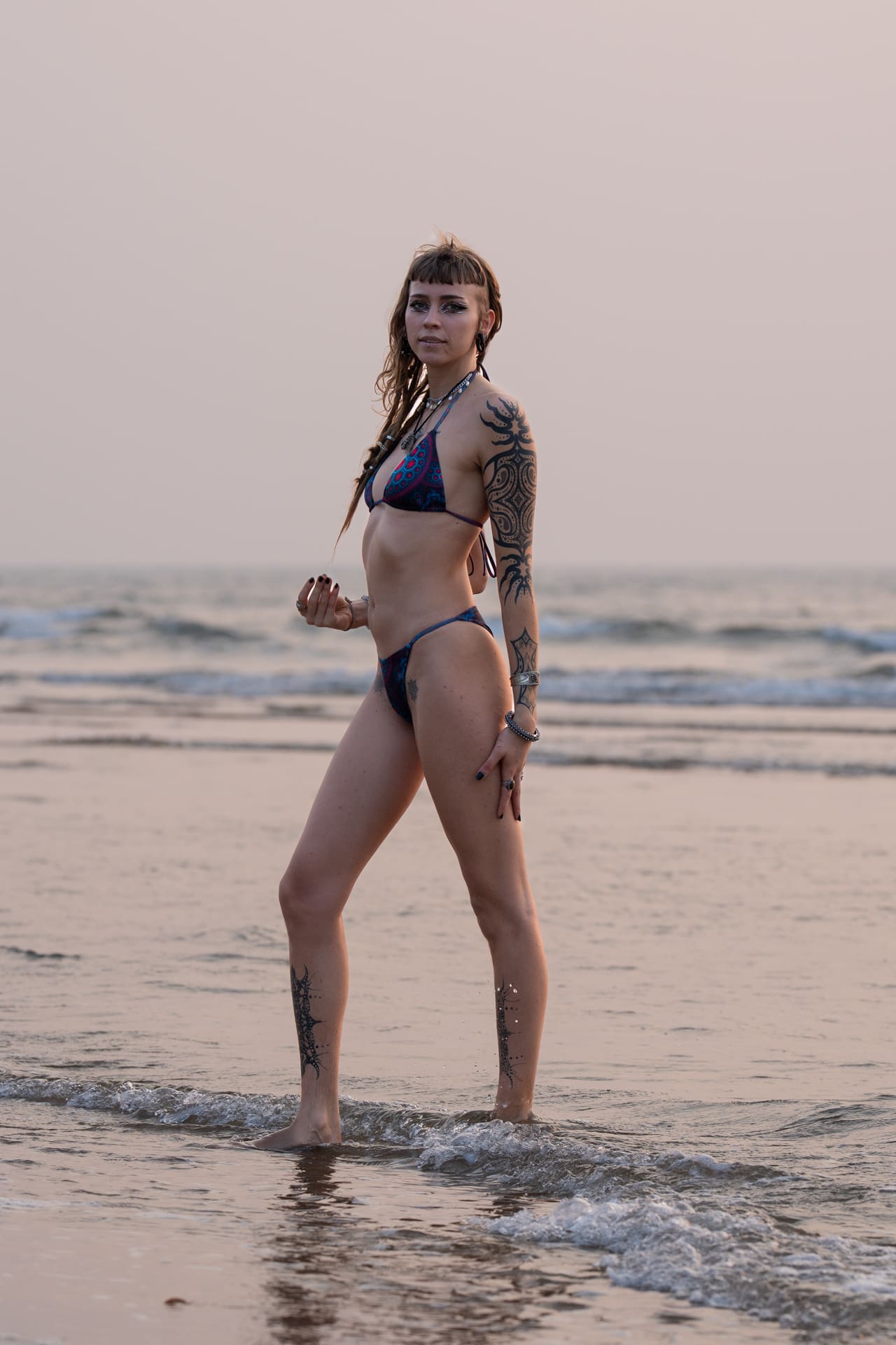 rave swimwear bikini set sunset beach full body view