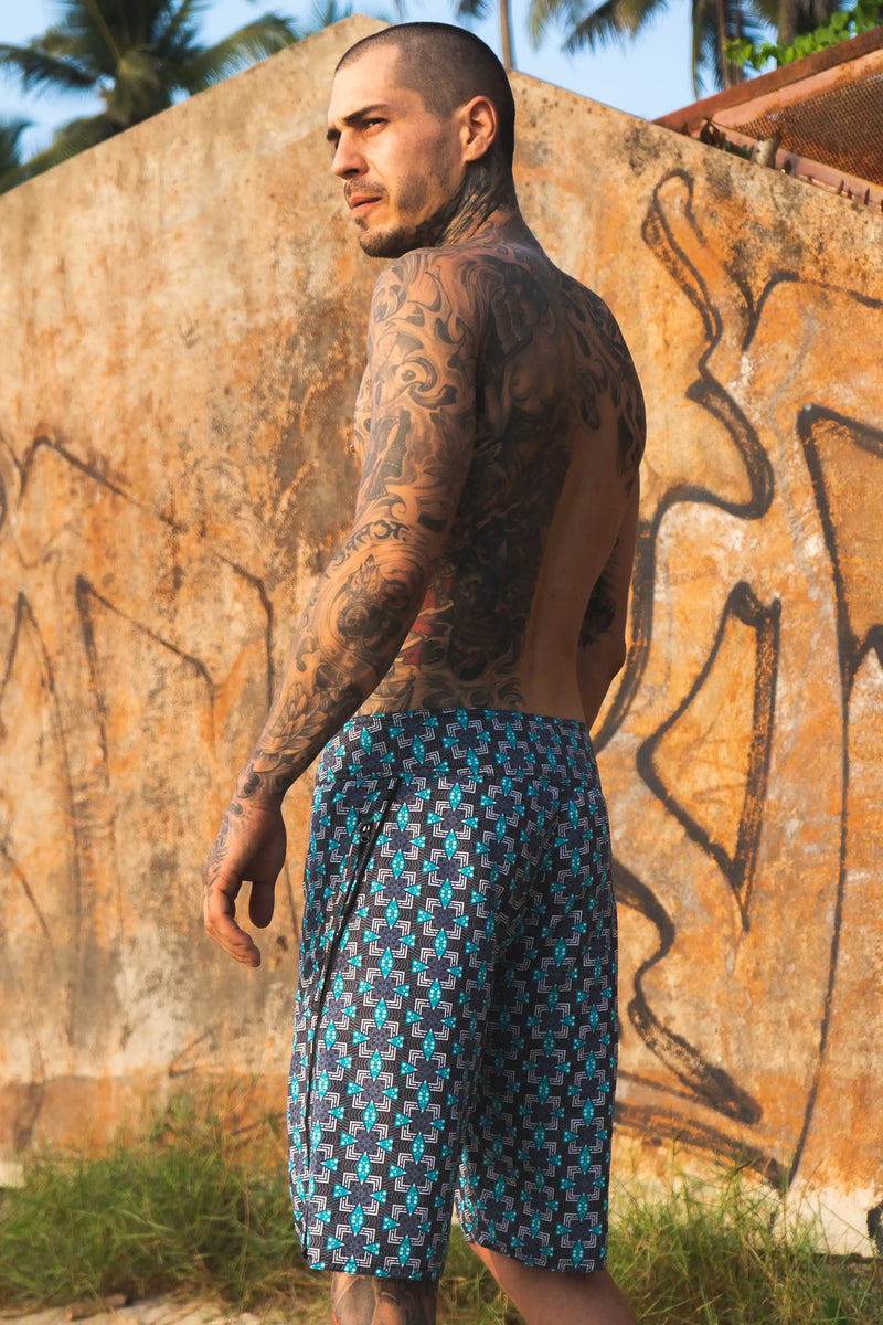 mens patterned board shorts zipper pocket side detail