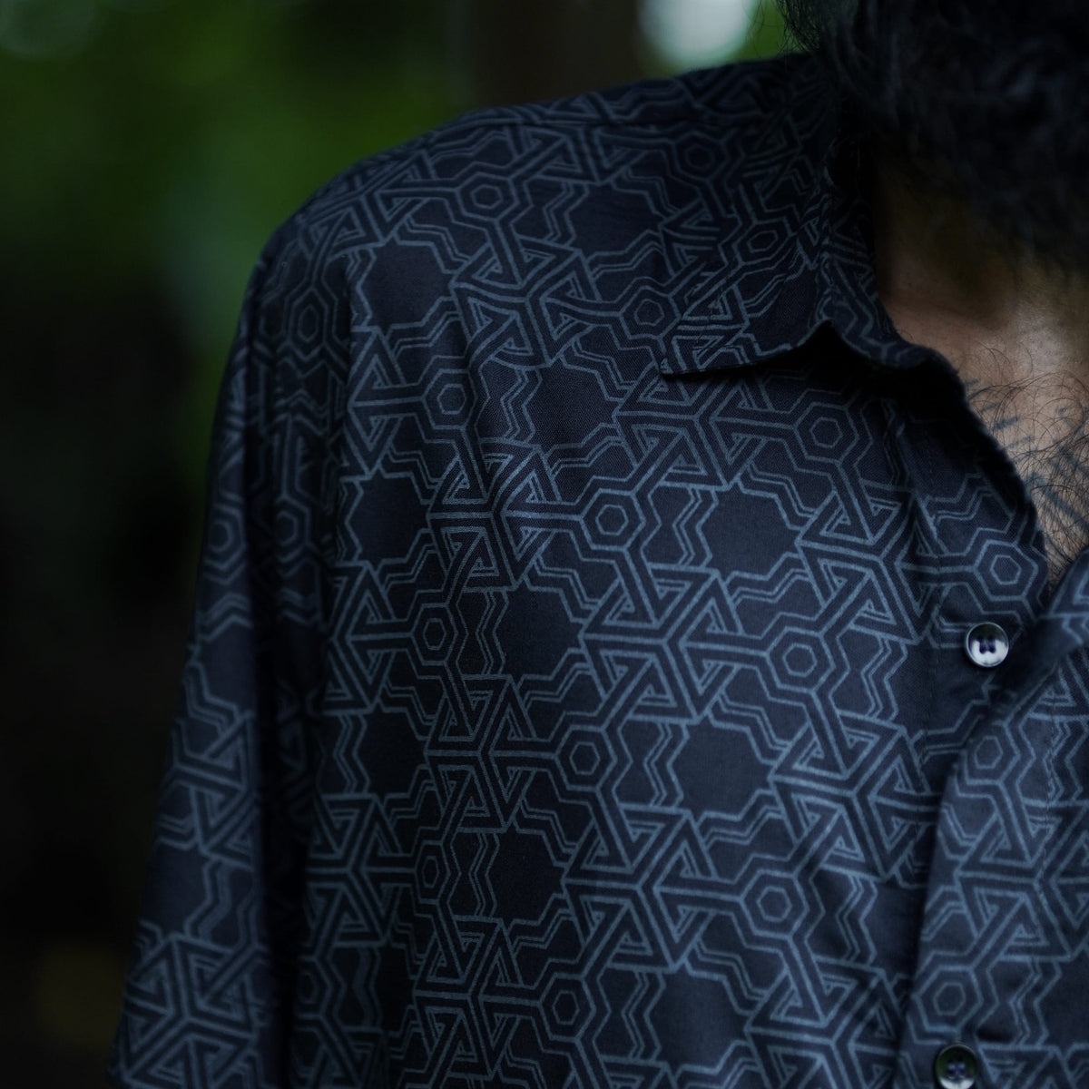 Pythagoras black men's viscose shirt close-up featuring sacred geometry print and short sleeves