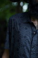 Pythagoras black men's viscose shirt close-up featuring sacred geometry print and short sleeves