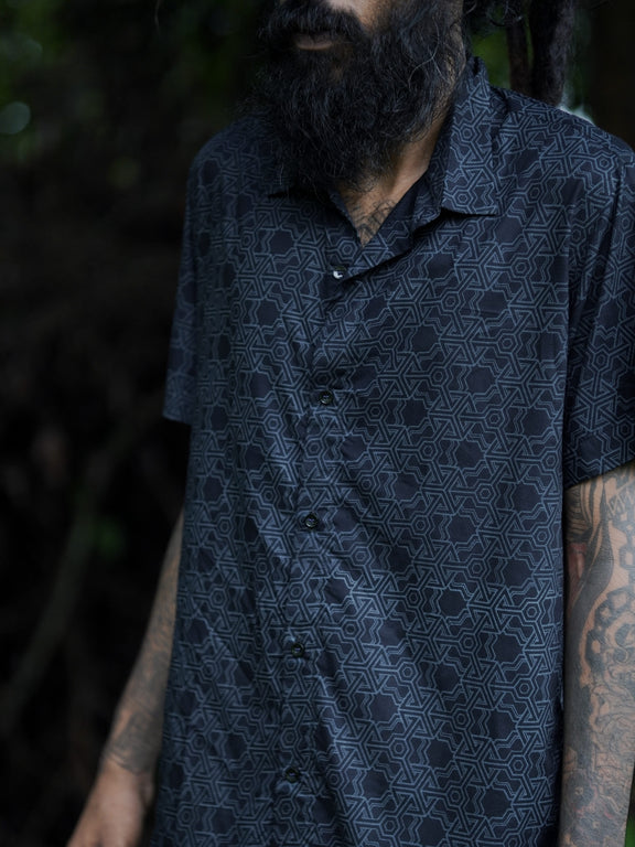 Front view of Pythagoras black men's viscose shirt with geometric sacred geometry pattern