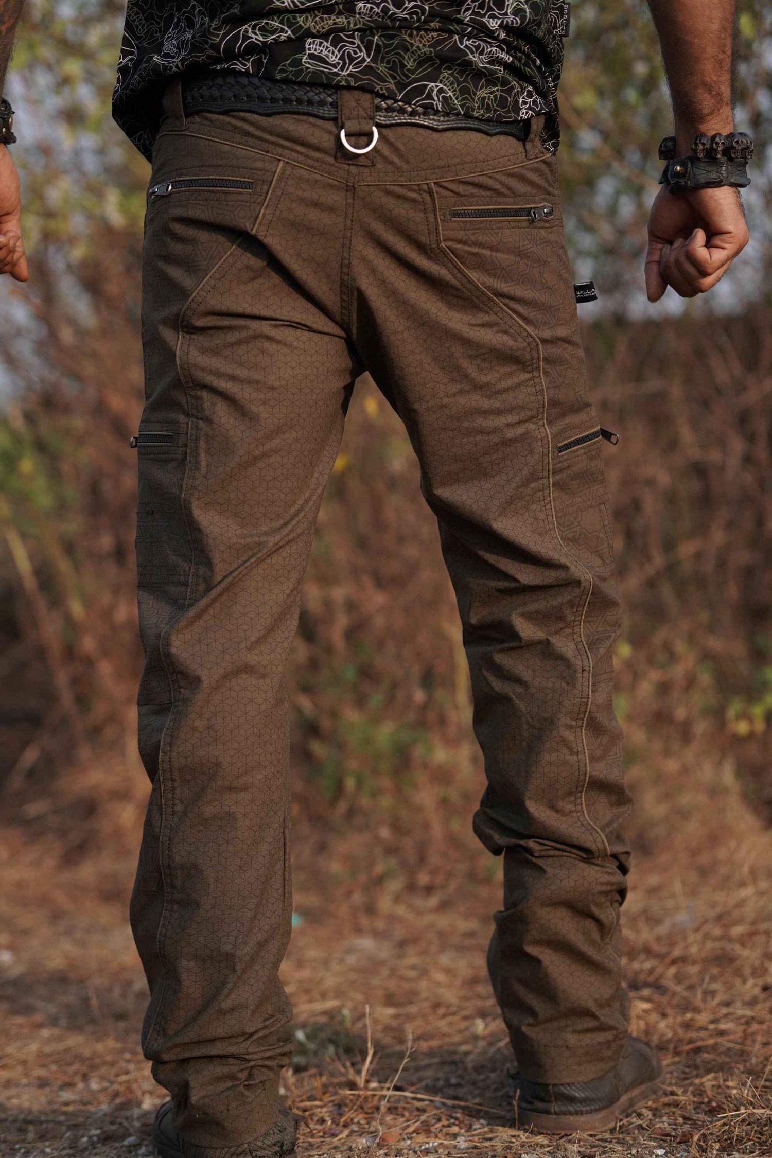 Back view of khaki cargo pants street wear for men with multi pockets and stretchable cotton fabric – Pythagoras Abstract NY design
