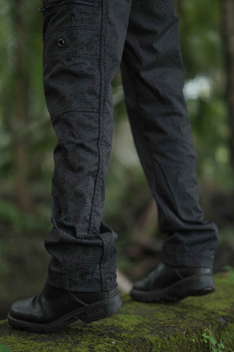 Model wearing Walla's Yantra print rave pants at a festival