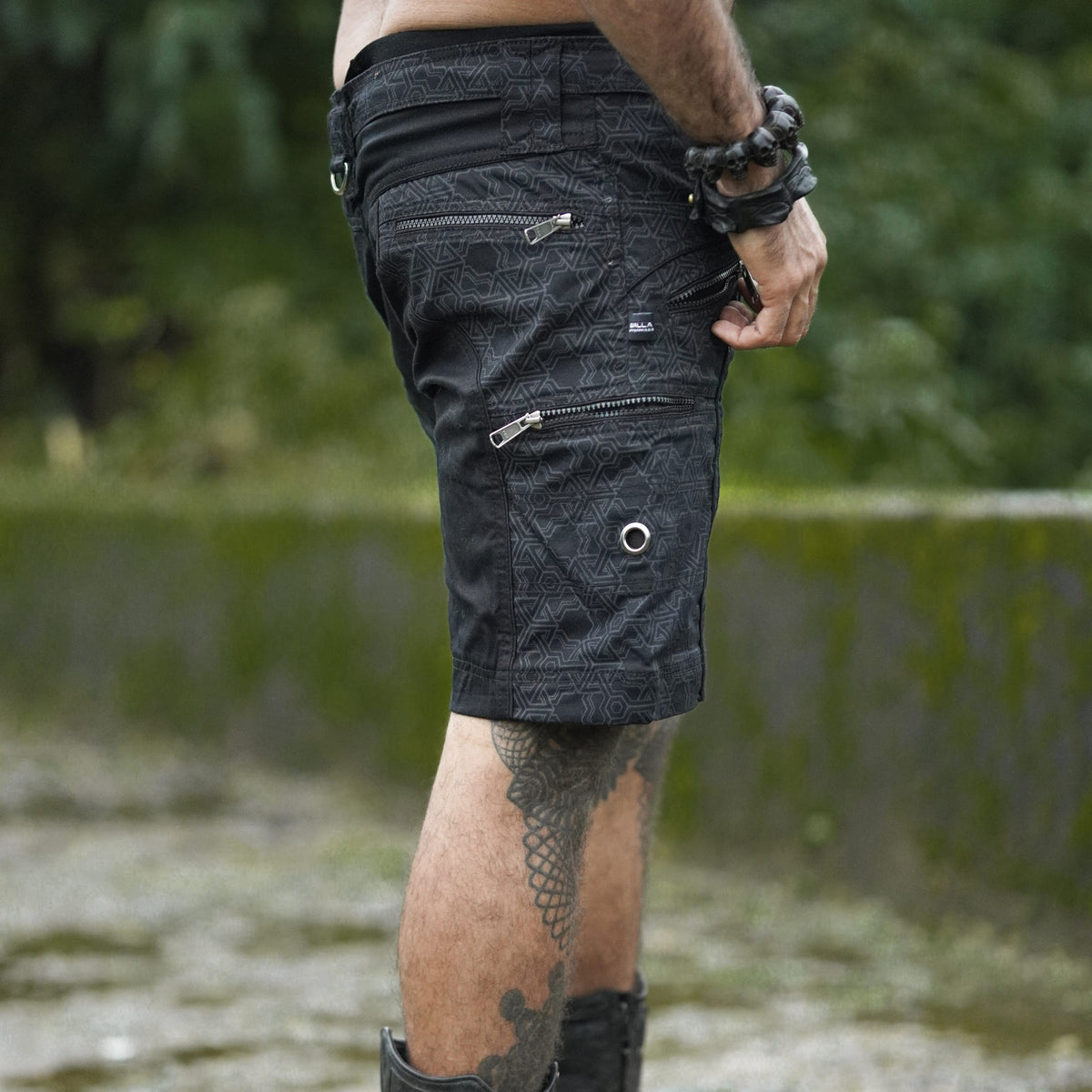 pythagoras jet black shorts side angle zipper pocket detail