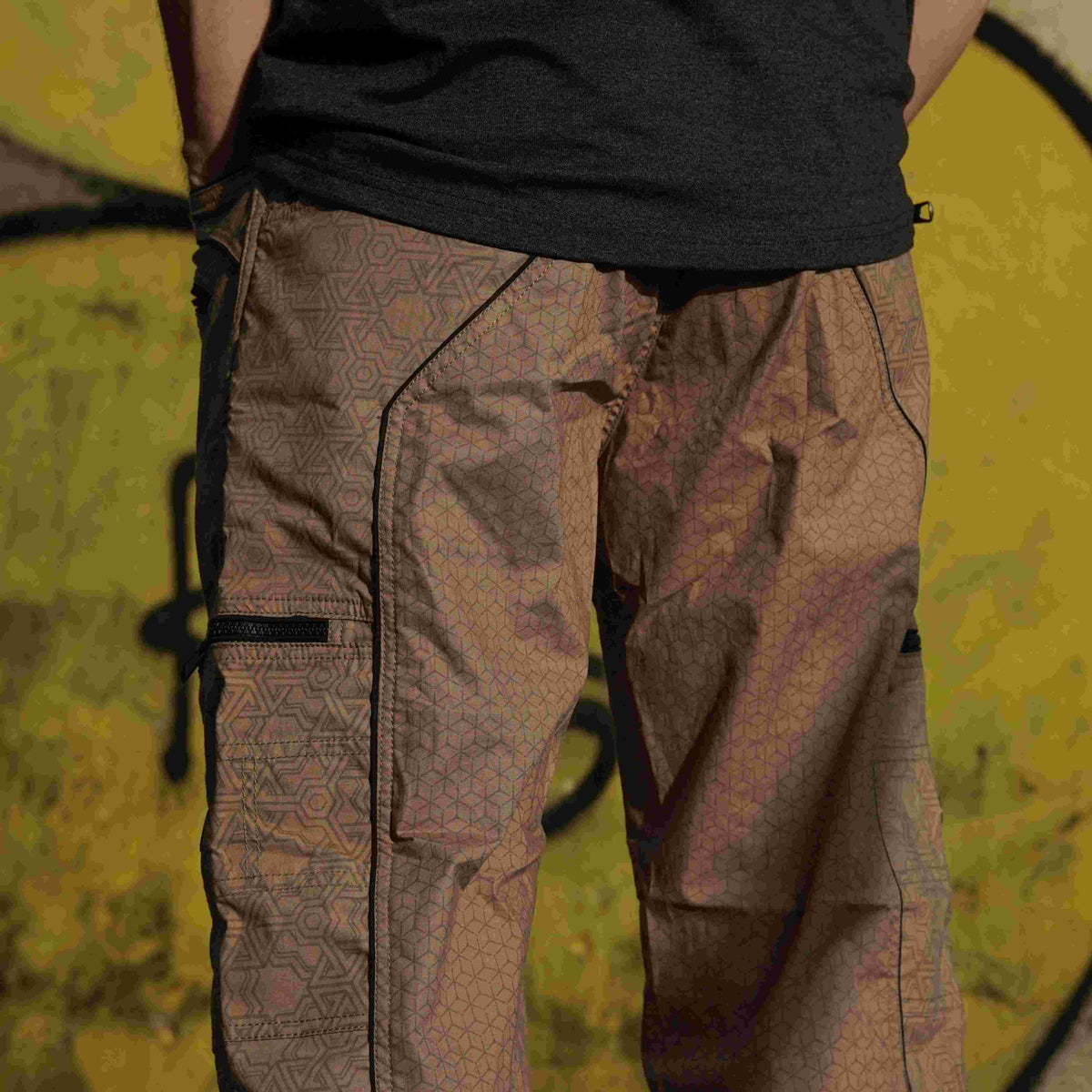three quarter cargo shorts dark beige back view