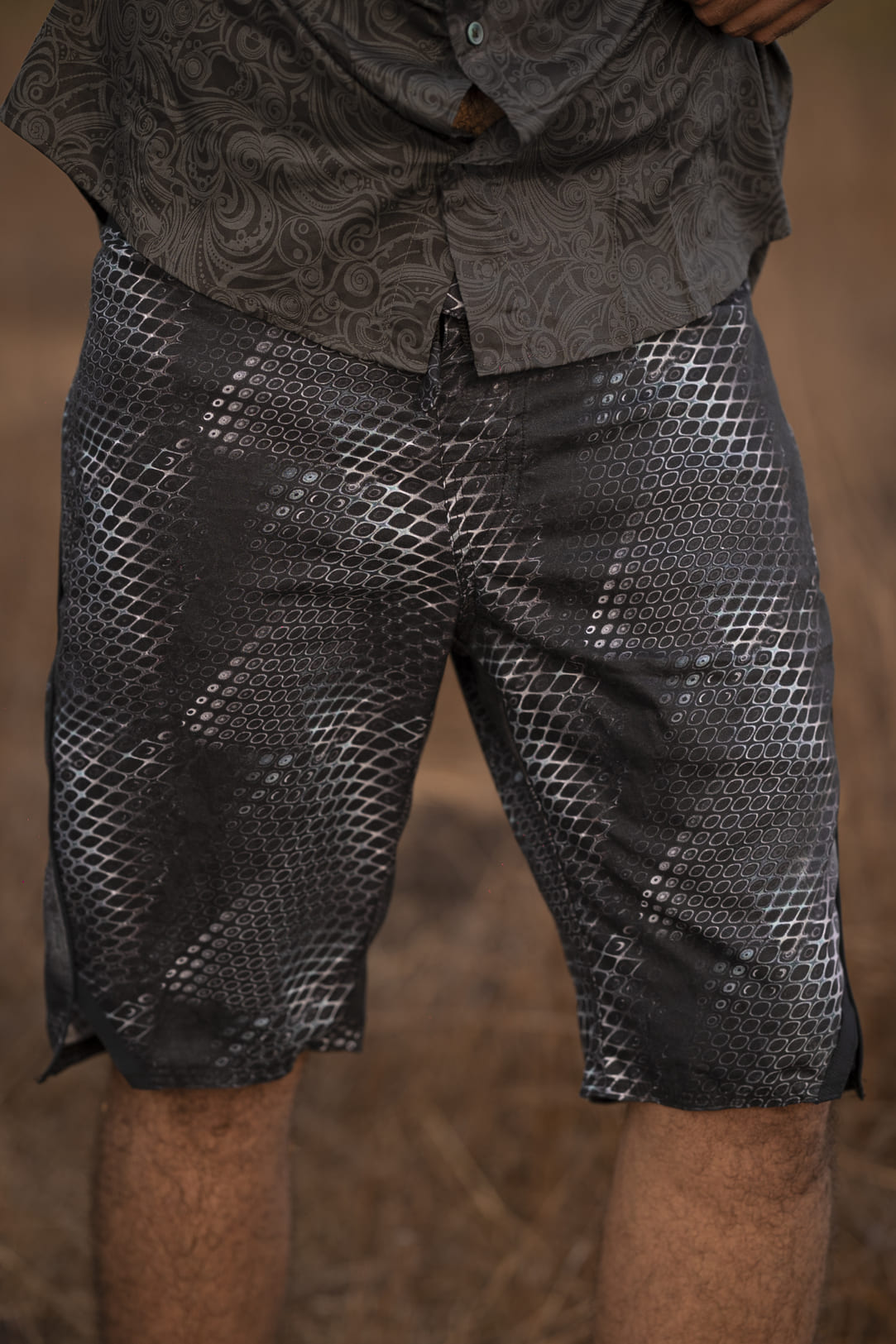 python print swim shorts for men black vortex pattern front view
