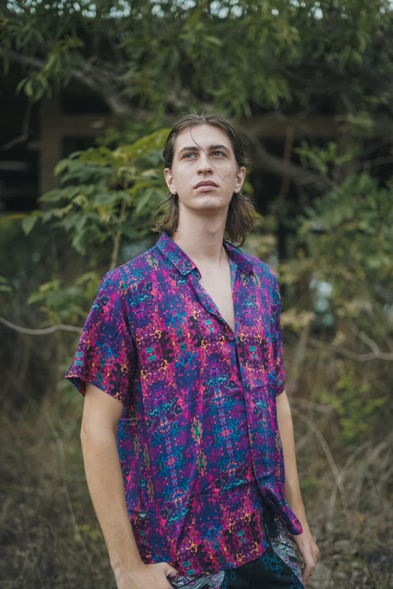 man wearing breathable bamboo shirt for men with psychedelic glitch design