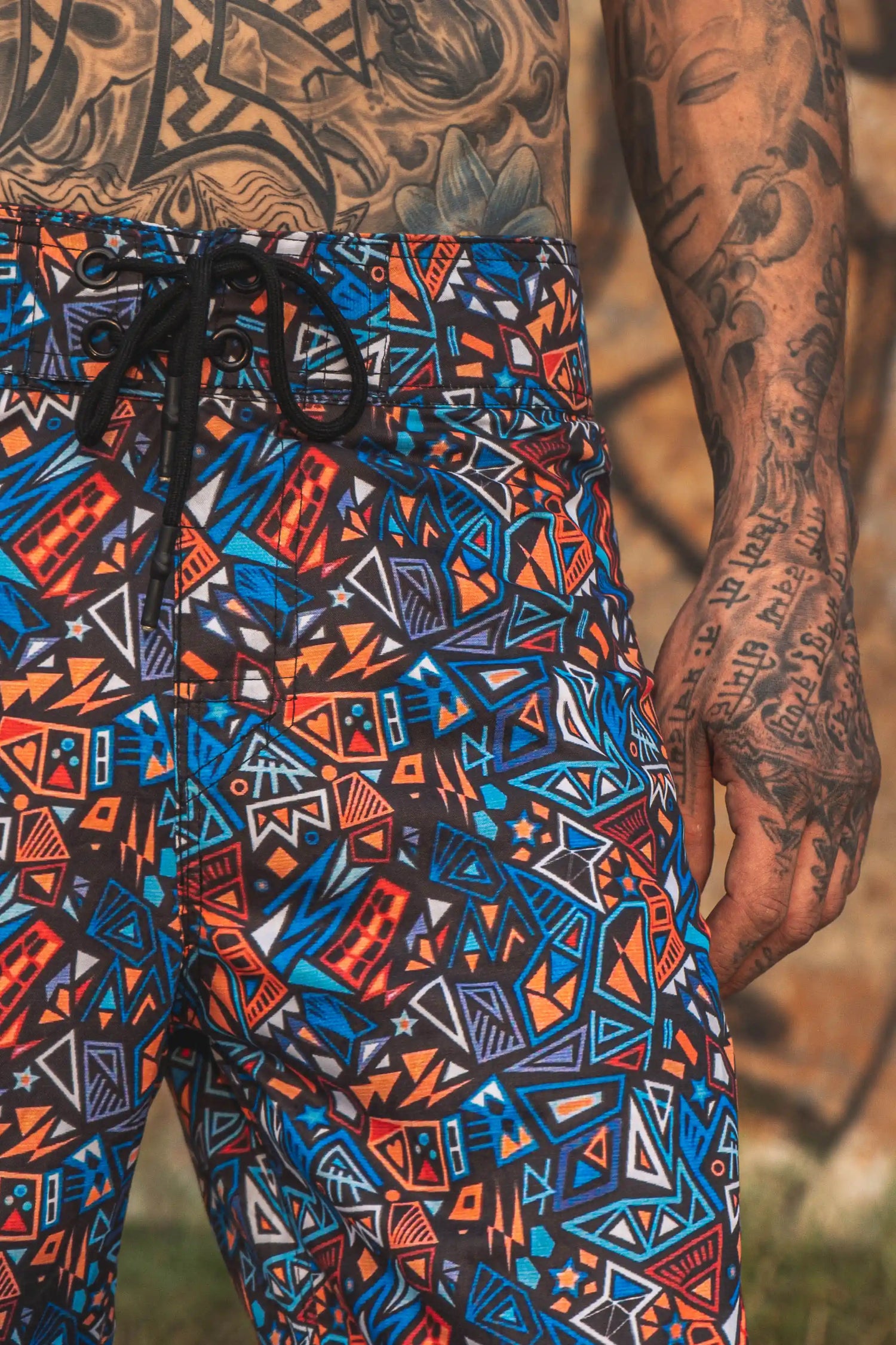 geometric print swim shorts for men colorful psychedelic pattern front view