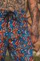 geometric print swim shorts for men colorful psychedelic pattern front view