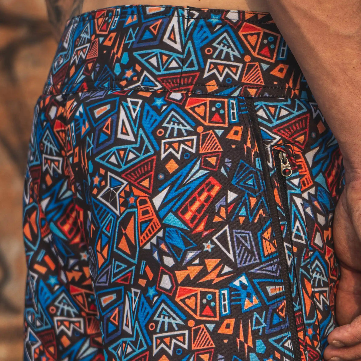 printed swim shorts side view geometric pattern with zipper pocket detail