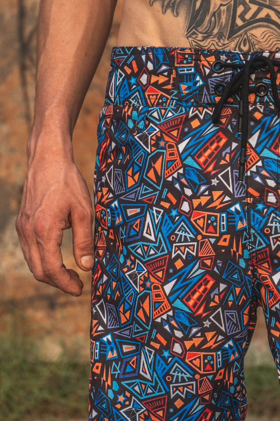 psychedelic geometric swim shorts close up abstract pattern detail
