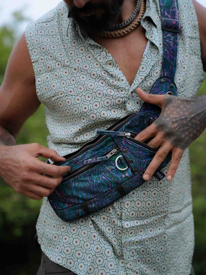 After Burn festival crossbody bag worn across the chest with multiple zippered pockets