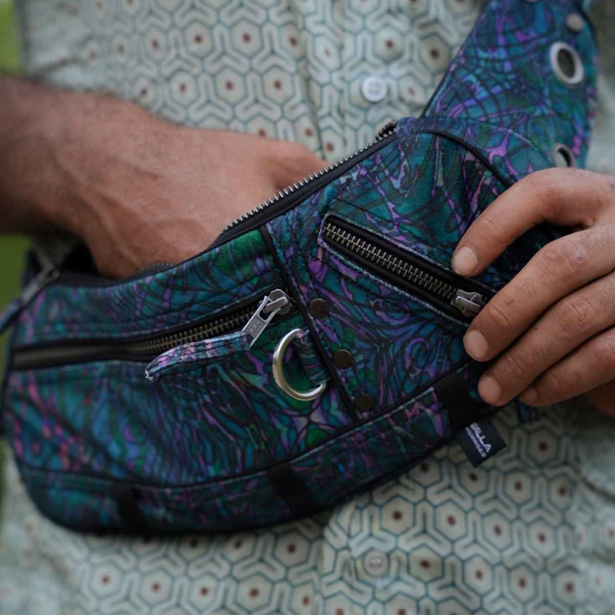 After Burn festival crossbody bag showing multiple compartments and zippered storage