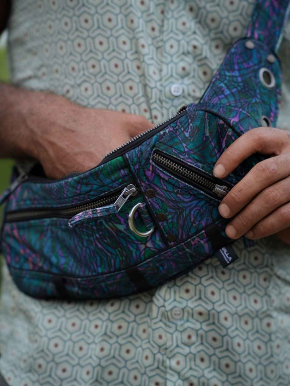 After Burn festival crossbody bag showing multiple compartments and zippered storage