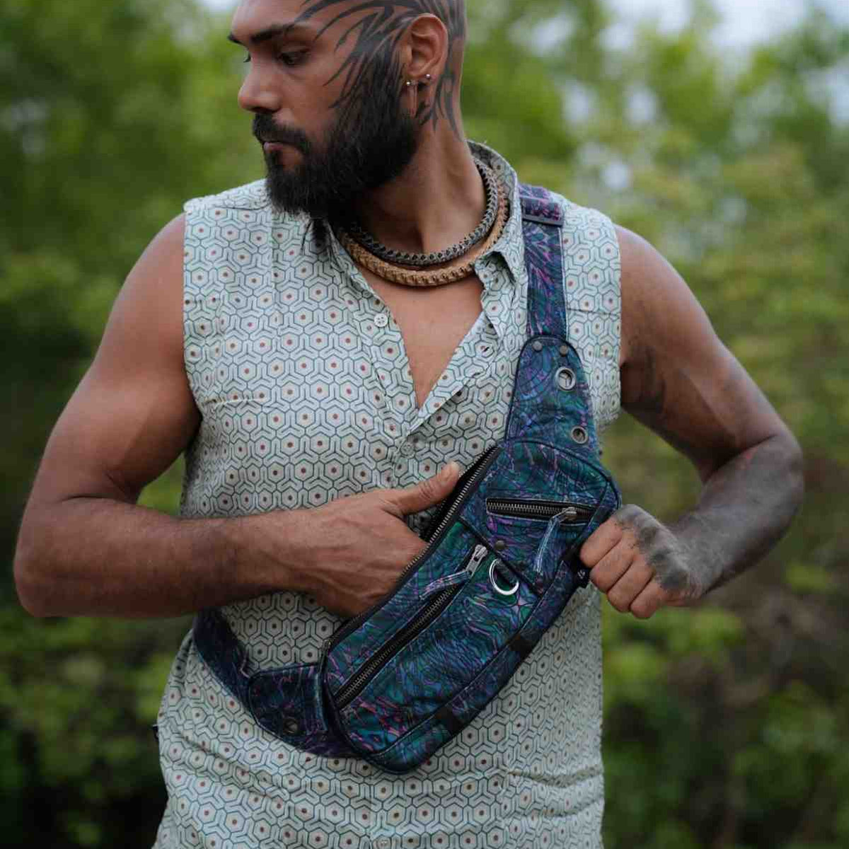 After Burn festival crossbody bag worn crossbody showing front and side storage pockets