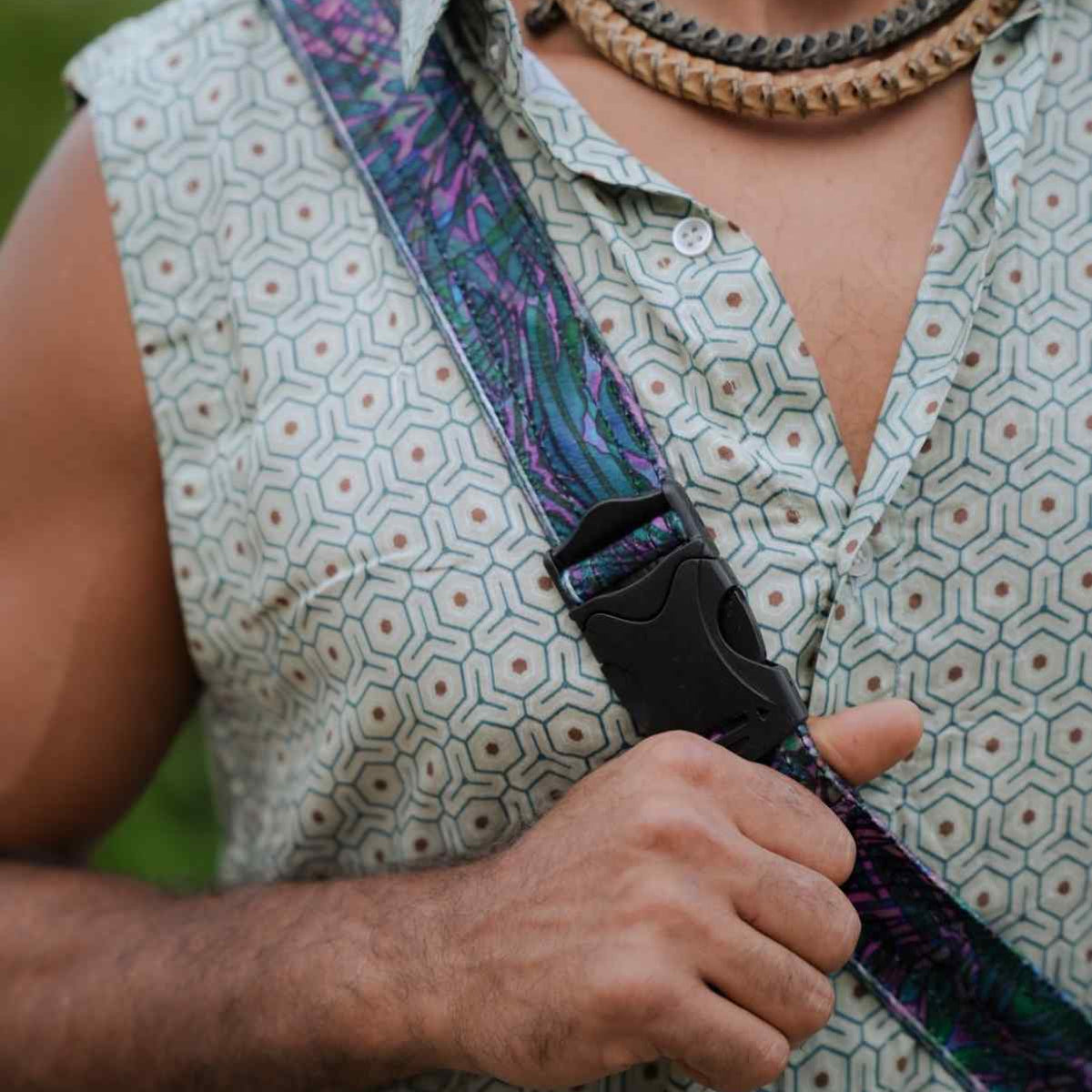 After Burn festival crossbody bag showing plastic strap hook and adjustable fastening