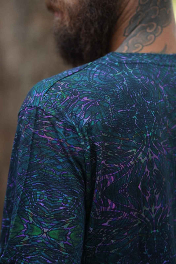Close-up of Afterburn dark psychedelic t shirt showing intricate sacred geometry digital artwork